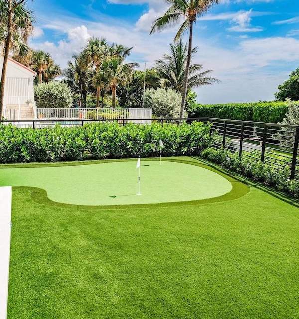Luxury backyard putting green and tropical estate landscape in Boca Raton FL-2-1 Luxury backyard putting green and tropical estate landscape in Boca Raton FL-2-1