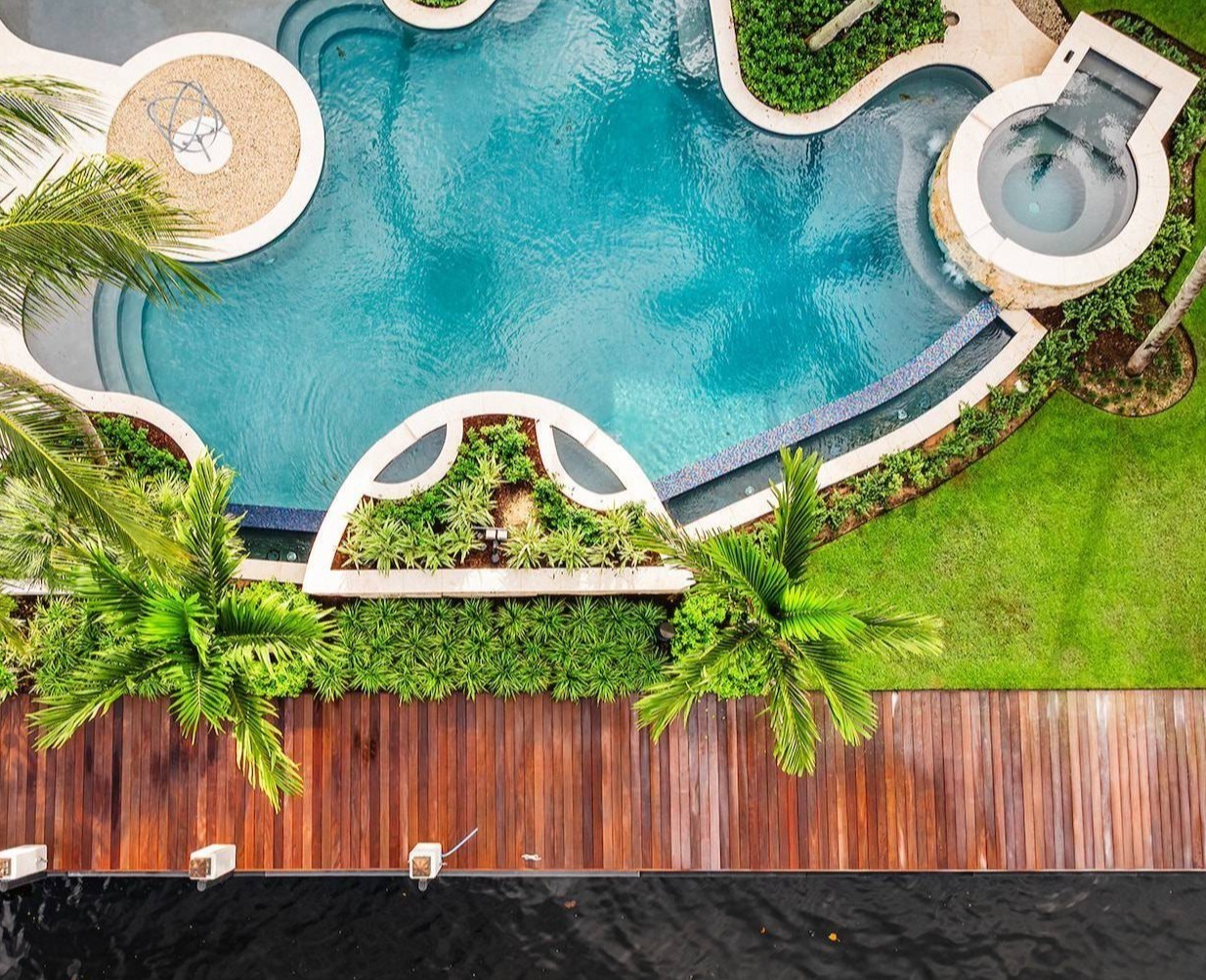 Tropical estate landscape with irrigation system and drainage solutions in Wellington, FL-1